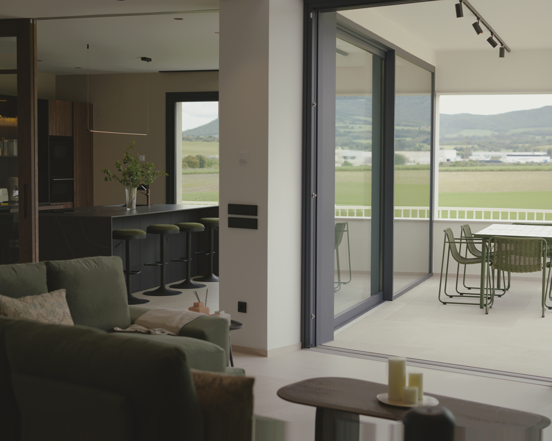 Interior de arquitectura moderna de obra nueva en Casa V por a.bolado arquitectura, donde destaca la sencillez material de la piedra y la búsqueda de paz y luz